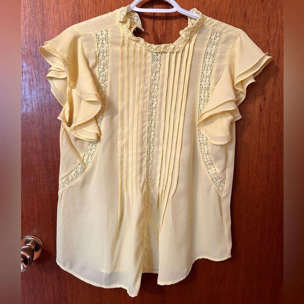 Pastel yellow ruffled shirt sleeve blouse
